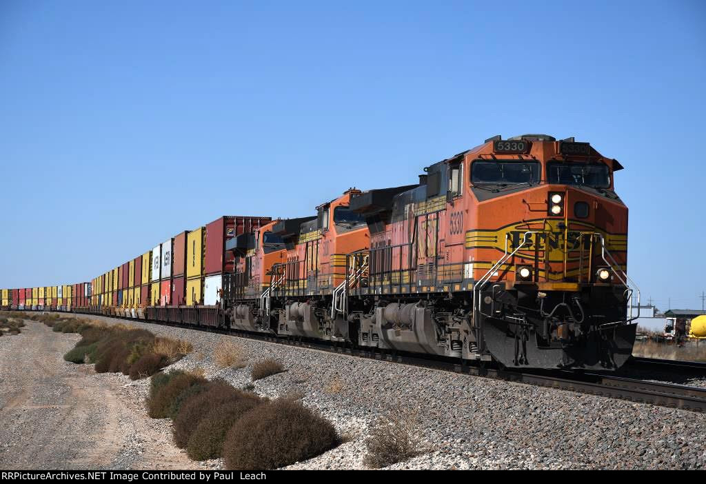 Stack train rolls east